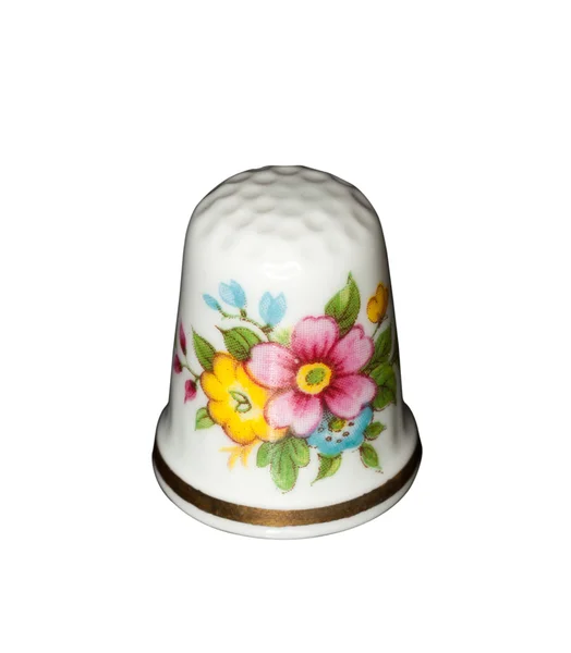 Poterie dé à coudre avec des fleurs peintes — Photo