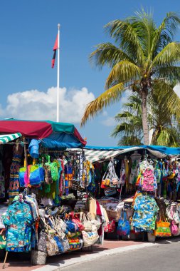 Clothes stall in market in Marigot St Martin clipart