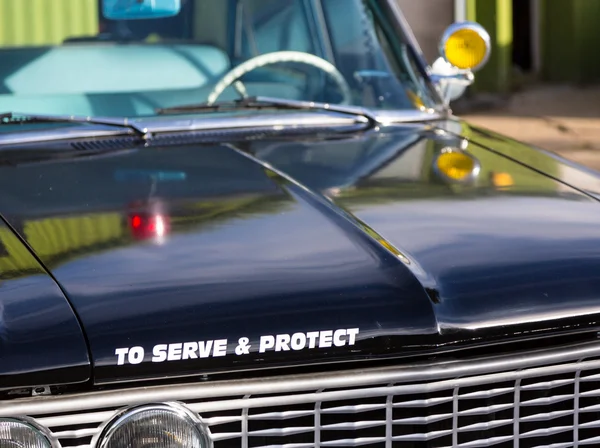 Vintage polis araba detay üzerinde kukuleta — Stok fotoğraf