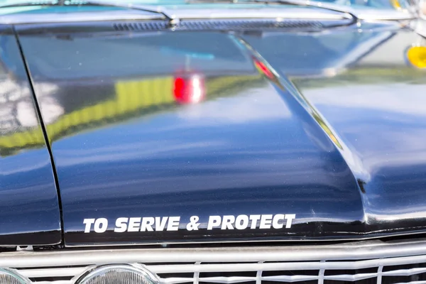 Vintage police car detail on hood — Stock Photo, Image