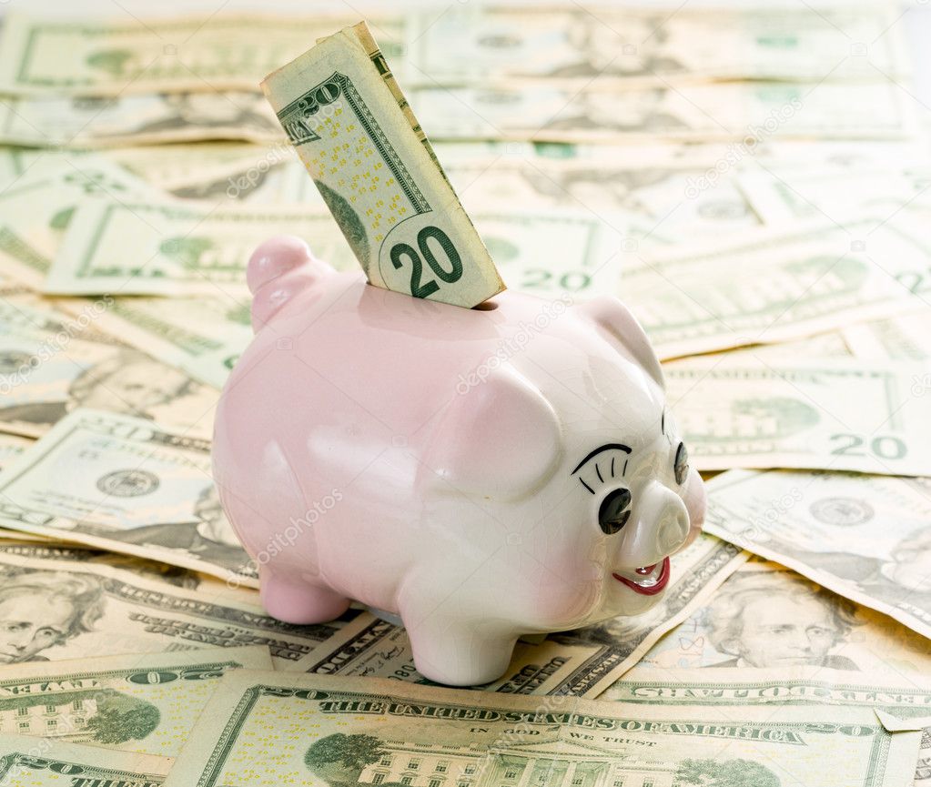 돼지 저금통의 슬롯에 20 달러 지폐 — 스톡 사진 © steveheap #22810080