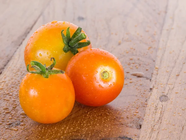 Macro image of three home grown tomatoes — Stock Photo, Image