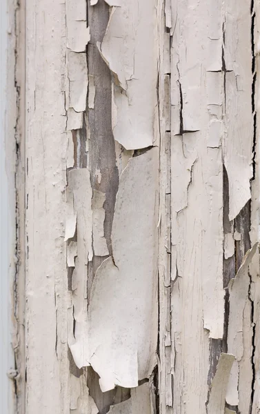 Peeling white paint on window frame — Stock Photo, Image