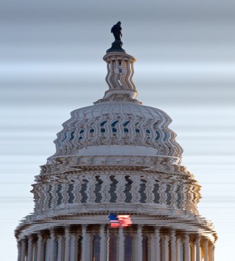 Distorted view of dome of Capitol in DC clipart