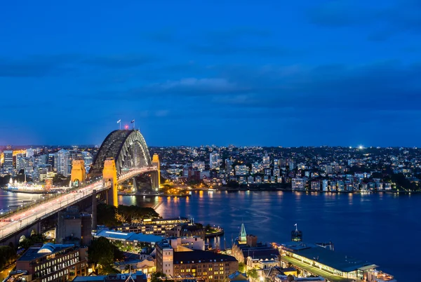 Dramatiska panoramautsikt över natt foto sydney harbor — Stockfoto