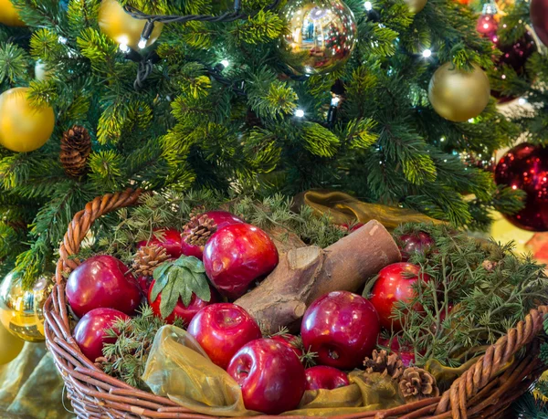 Gold and red decorations on xmas tree — Stock Photo, Image