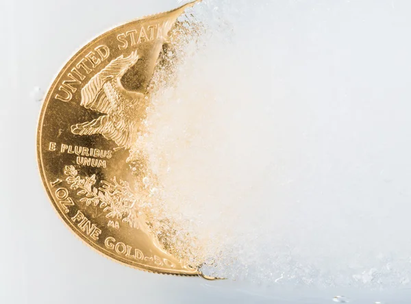 Golden Eagle coin emerging from deep freeze — Stock Photo, Image