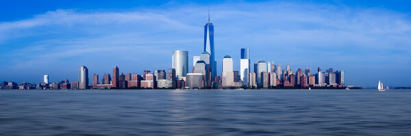 Panorama of lower Manhattan of New York City from Exchange Place at dusk with World Trade Center at full height of 1776 feet