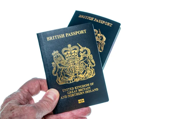 Nuevo post Brexit azul Reino Unido pasaporte sobre un fondo blanco —  Fotos de Stock
