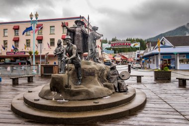 Ketchikan, AK - 10 June 2022: Statue to pioneers called The Rock in Ketchikan Alaska