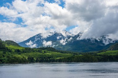 Misty view of Mt Menzies seen from cruise ship in the Discovery Passage in British Columbia