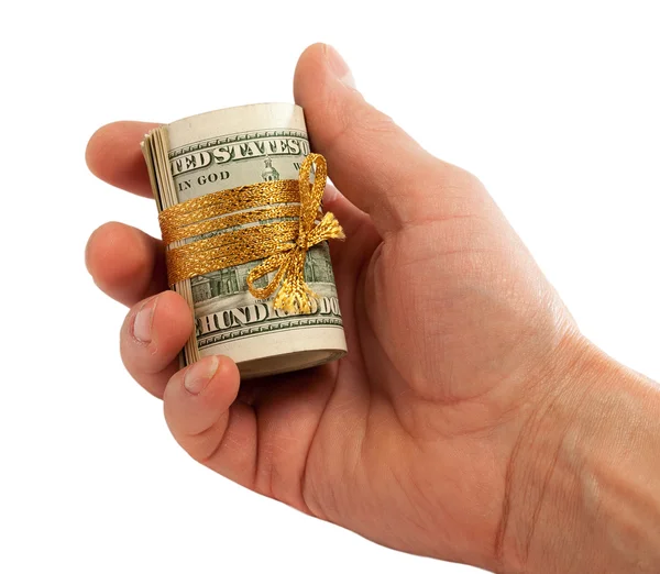 Roll of dollars in hand. — Stock Photo, Image