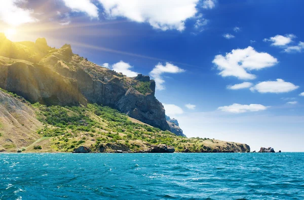 Sea and clouds sky with sun — Stock Photo, Image