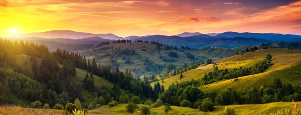 Beautiful green hills at dusk — Stock Photo, Image