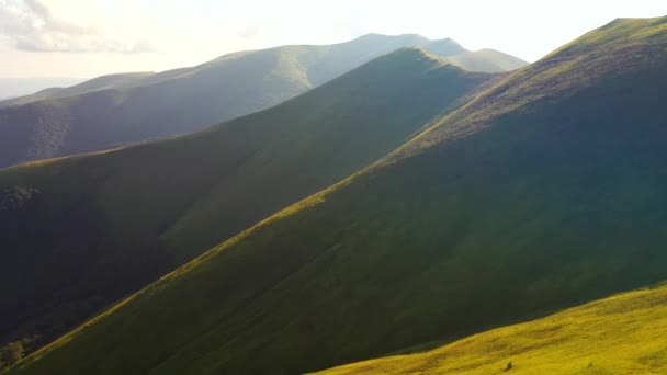 Drone Flies Green Mountain Ranges Illuminated Sun Filmed Video — Stock Video