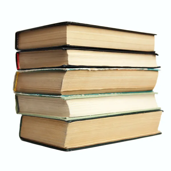 Fragment pile of old books on white background. — Stock Photo, Image