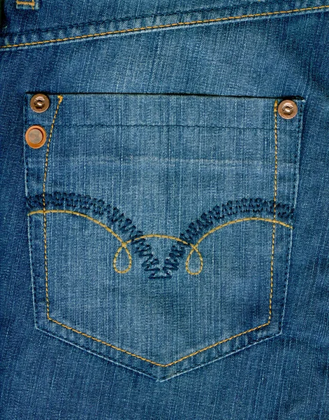 Blue jeans met pocket op achtergrond. — Stockfoto