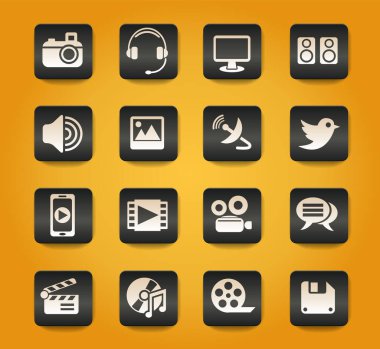 Sarı arkaplanda siyah düğmeler üzerine medya simgeleri