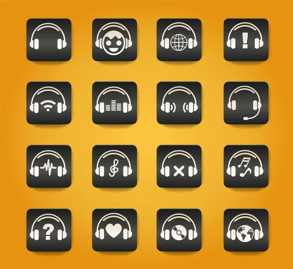 Kopfhörer Symbole Auf Schwarzen Tasten Auf Gelbem Hintergrund — Stockvektor