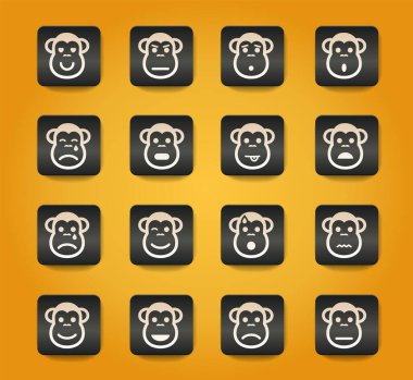 Sarı arkaplandaki siyah düğmelerdeki maymun duygu simgeleri