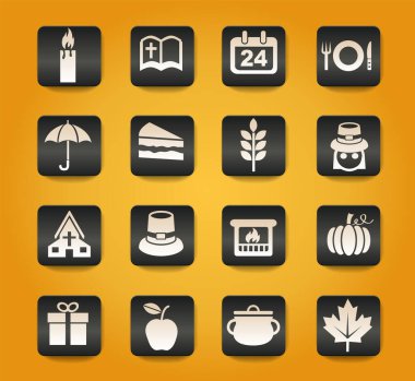 Sarı arkaplandaki siyah düğmelerdeki şükran günü sembolleri