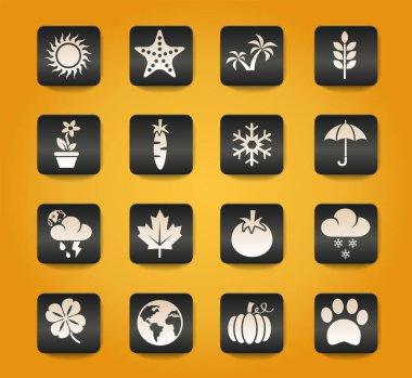 Sarı arkaplandaki siyah düğmelerdeki doğa sembolleri