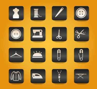 Sarı arkaplandaki siyah düğmelerdeki terzilik sembolleri