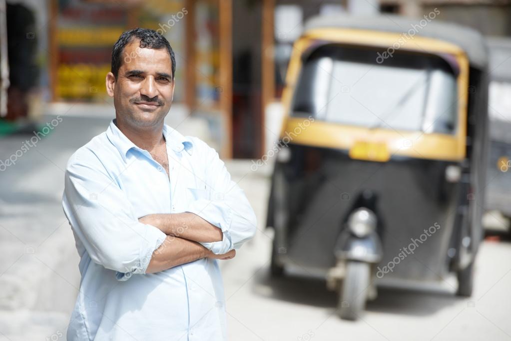 Indian auto rickshaw tut-tuk driver man