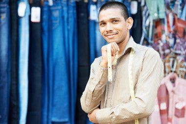 Young indian tailor man clipart