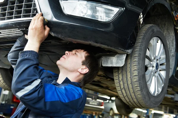 Auto car repair mechanic at work — Stock Photo, Image