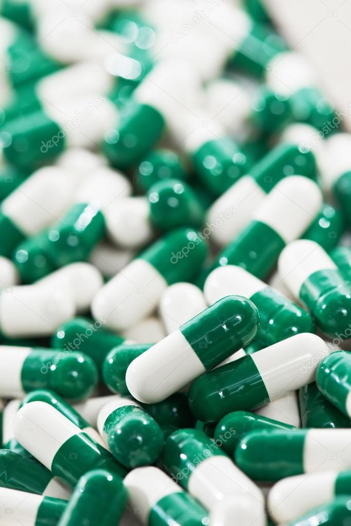 White green capsule pills with medicine antibiotic