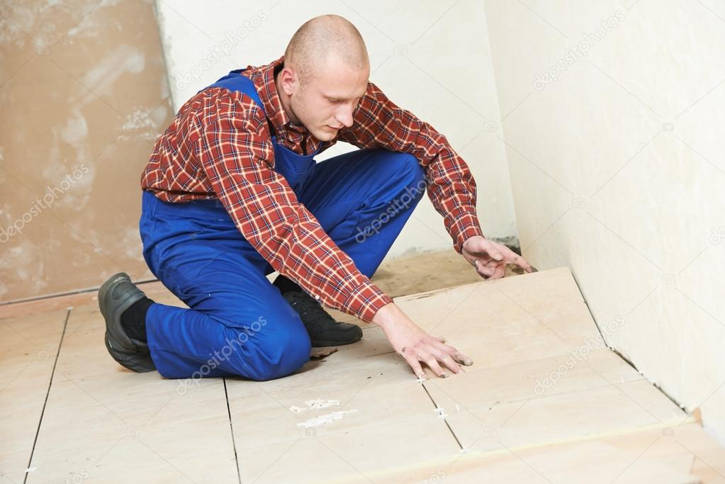 Tiler at home floor tiling renovation work