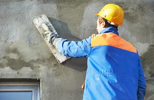 Facade builder plasterer at work — Stock Photo, Image