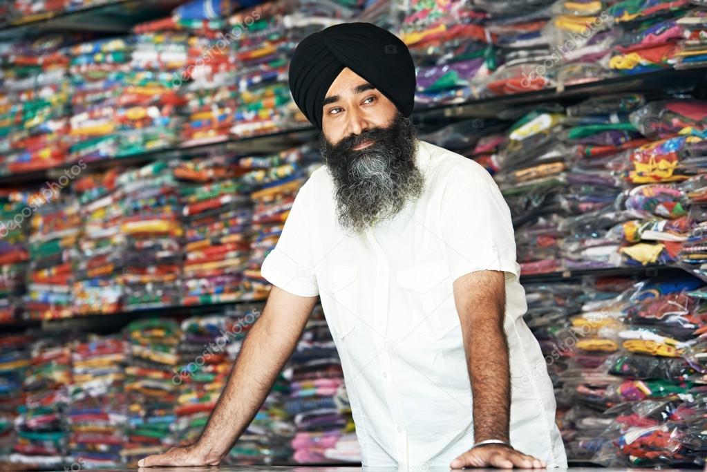 Young adult indian sikh seller man