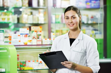 Pharmacy chemist woman in drugstore clipart