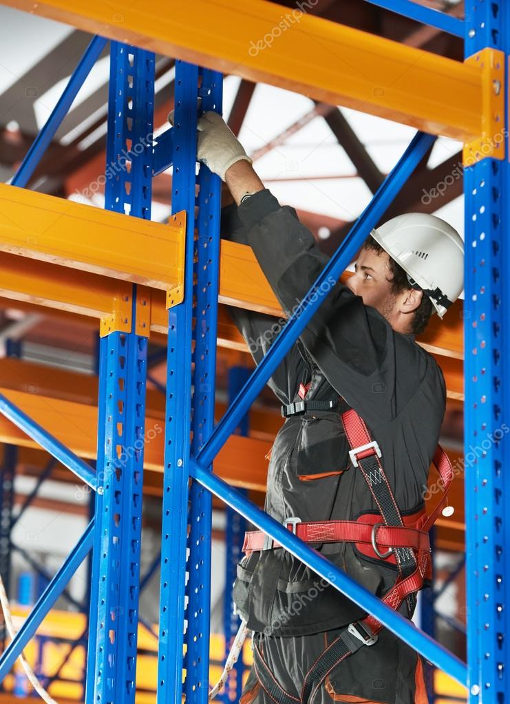 Warehouse worker installing rack arrangement — Stock Photo © kalinovsky