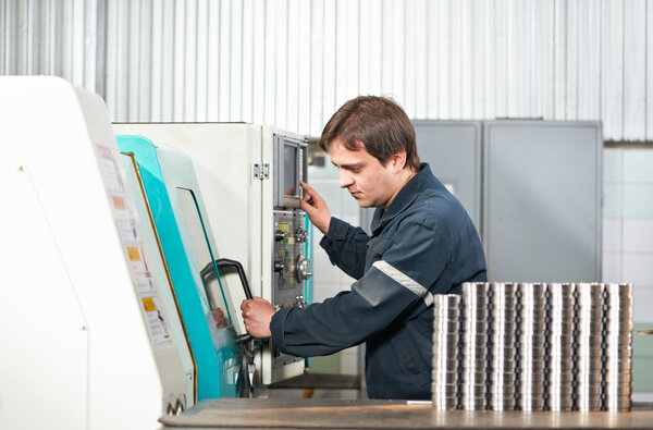 Worker at tool workshop