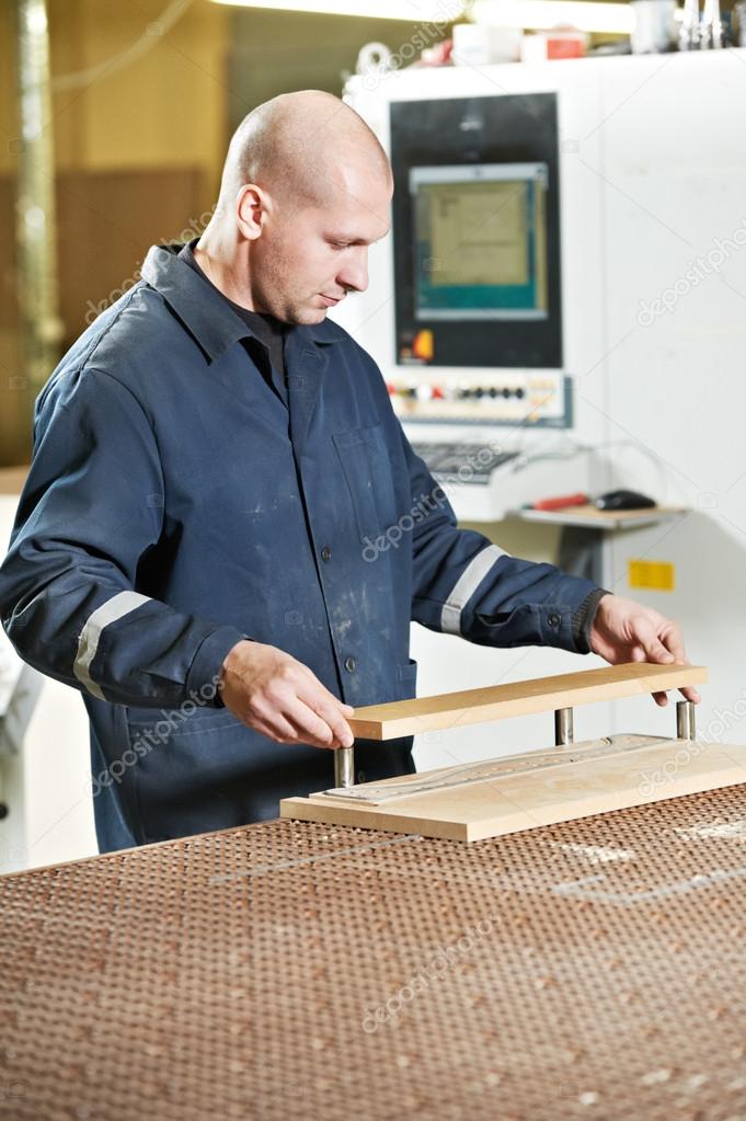 Wood furniture worker at workshop