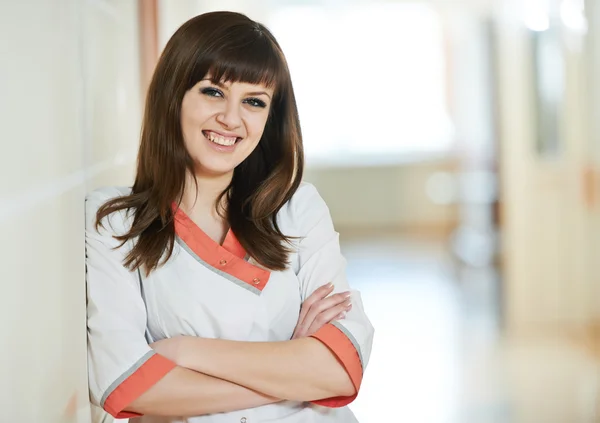 Young happy medic nurse in hospital — Stock Photo, Image