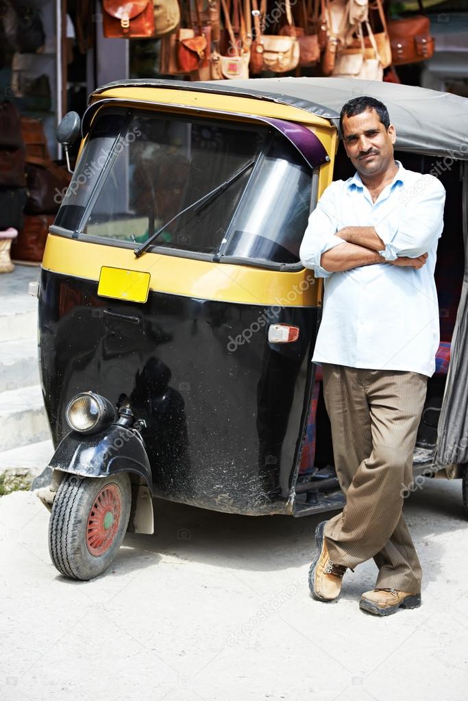 Indian auto rickshaw tut-tuk driver man