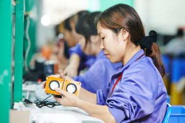 Chinese male worker at manufacturing