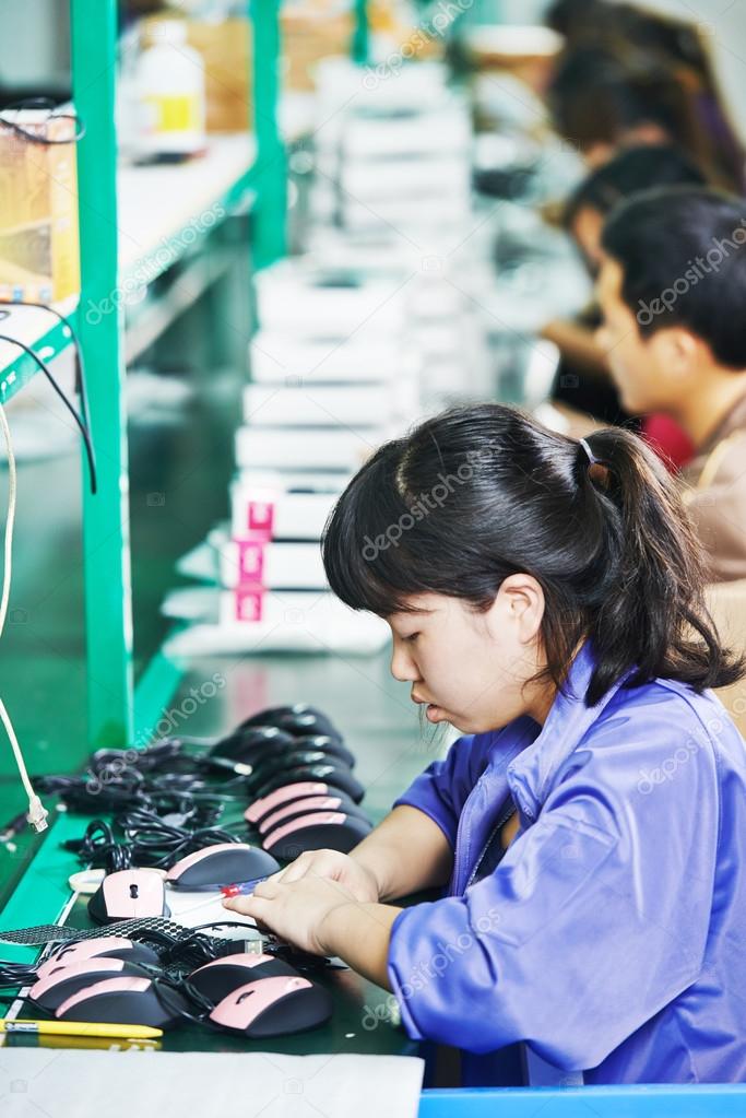 Female chinese worker in factory