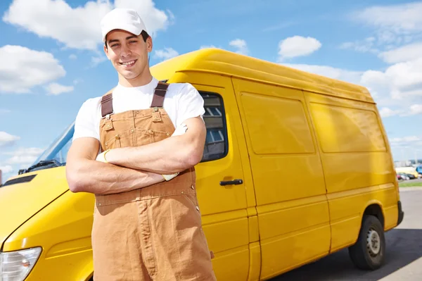 Delivery man with distribution van — Stock Photo, Image