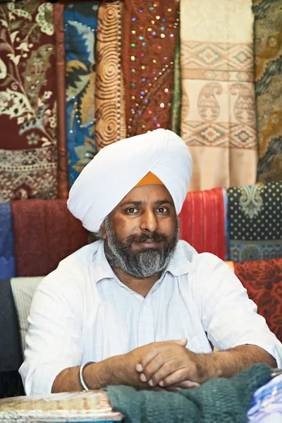 Adult indian sikh seller man — Stock Photo, Image