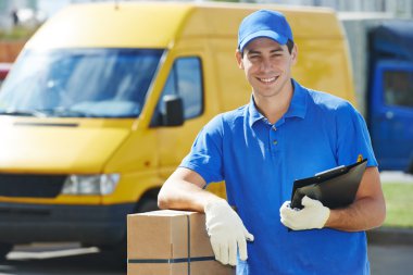 Delivery man with parcel box clipart