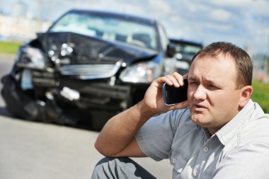 Upset driver man after car crash clipart