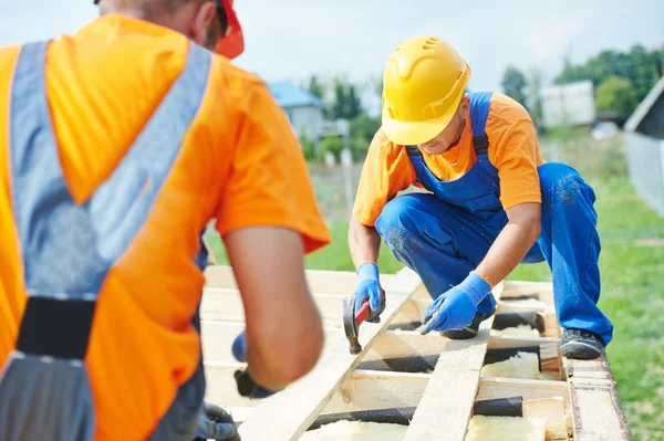 Carpenter workers on roof — Stock Image Carpenter workers on roof Stock Photo