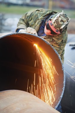 Welder worker with flame torch cutter