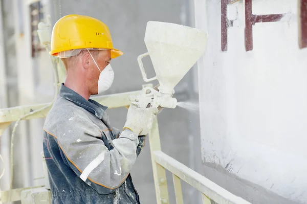 Builder facade plasterer worker — Stock Image Builder facade plasterer worker Royalty Free Stock Photos