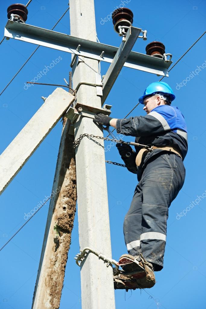 Power electrician lineman at work on pole — Stock Photo © kalinovsky